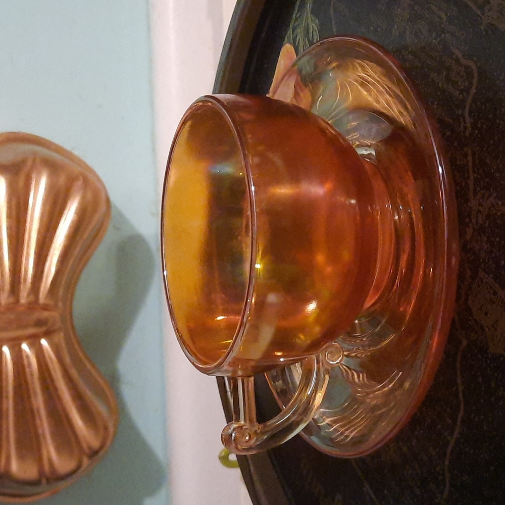 Antique Iridescent teacup and saucer